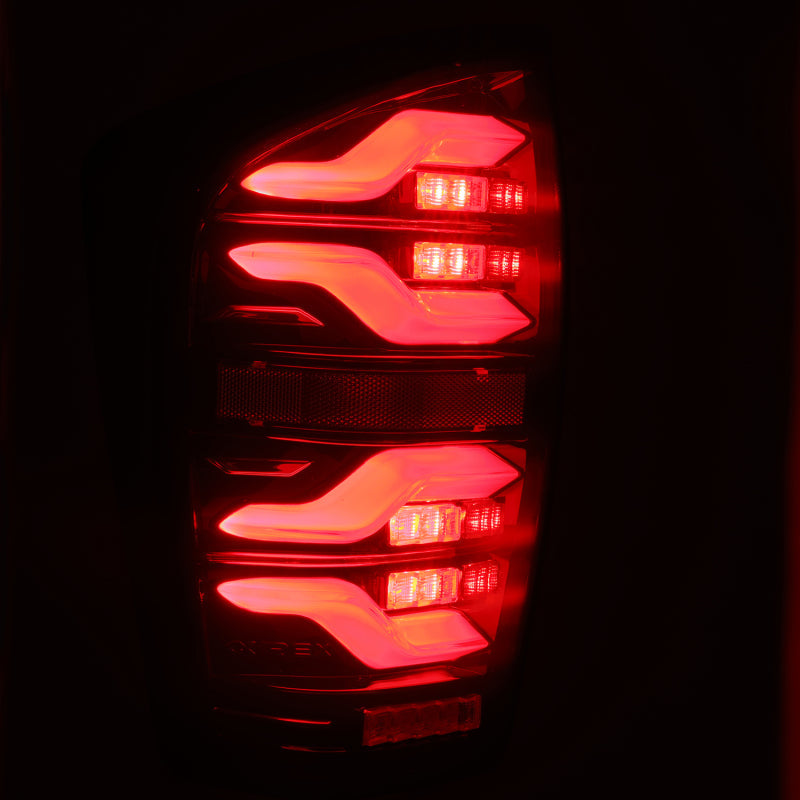 AlphaRex 16-21 Toyota Tacoma LUXX LED Taillights Blk/Red w/Activ Light/Seq Signal 680000