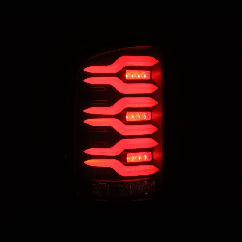 AlphaRex 14-18 GMC Sierra 1500/2500HD/3500HD LUXX-Series LED Tail Lights Blk w/Actv Light & Seq. Sig 630040