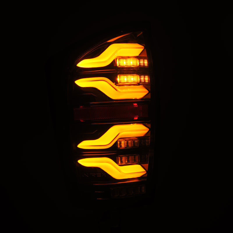 AlphaRex 16-21 Toyota Tacoma LUXX LED Taillights Alpha Blk w/Activ Light/Seq Signal 680080