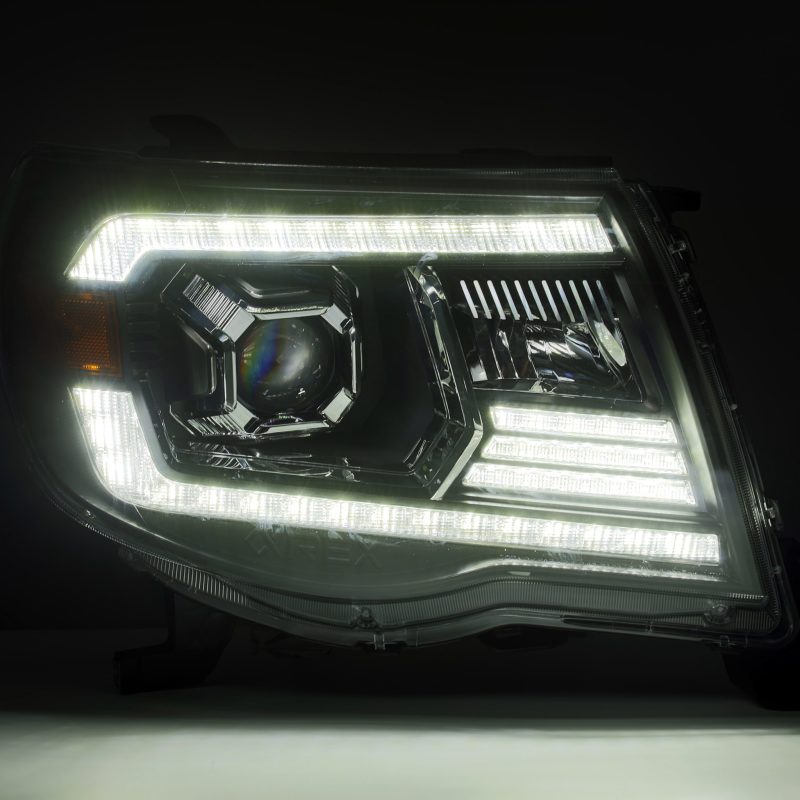 AlphaRex 05-11 Toyota Tacoma LUXX LED Projector Headlights Plank Style Alpha Black w/Activ Light/DRL 880739