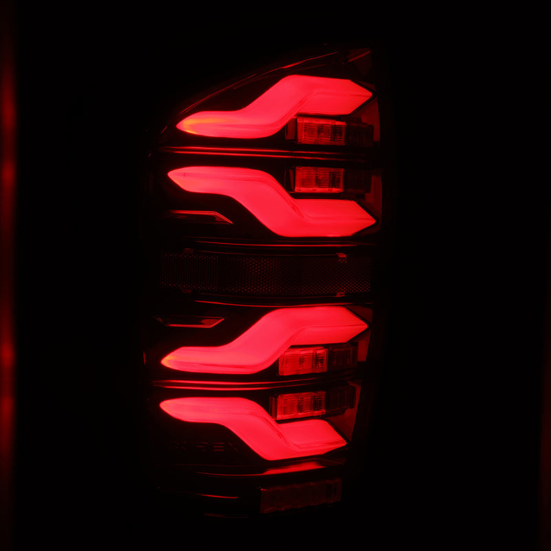AlphaRex 16-21 Toyota Tacoma LUXX LED Taillights Blk/Red w/Activ Light/Seq Signal 680000