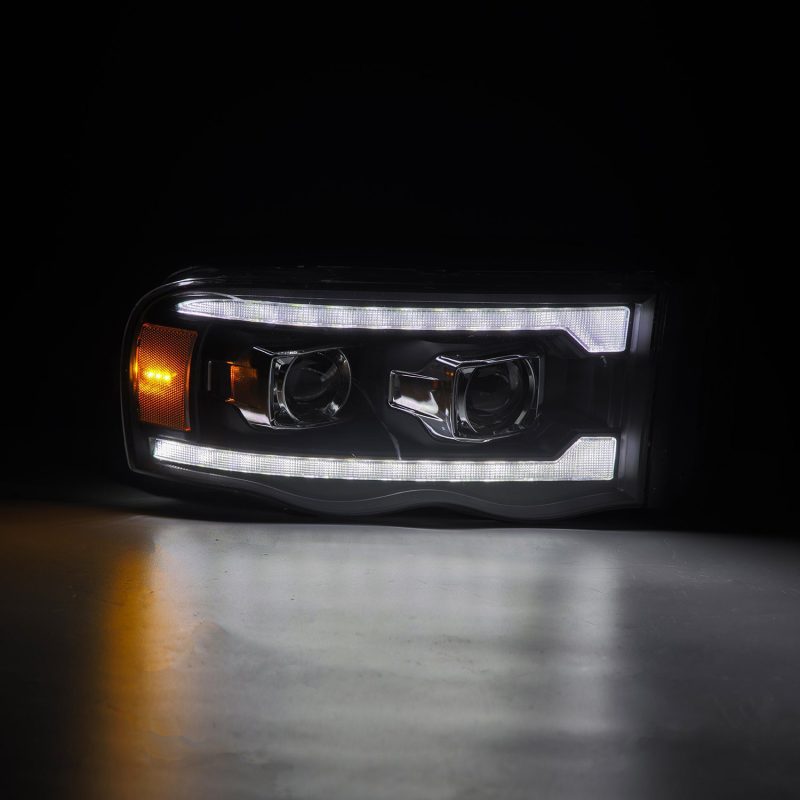 AlphaRex 02-05 Dodge Ram 1500 LUXX LED Proj Headlights Plank Style Black w/Activ Light/Seq Signal 880567
