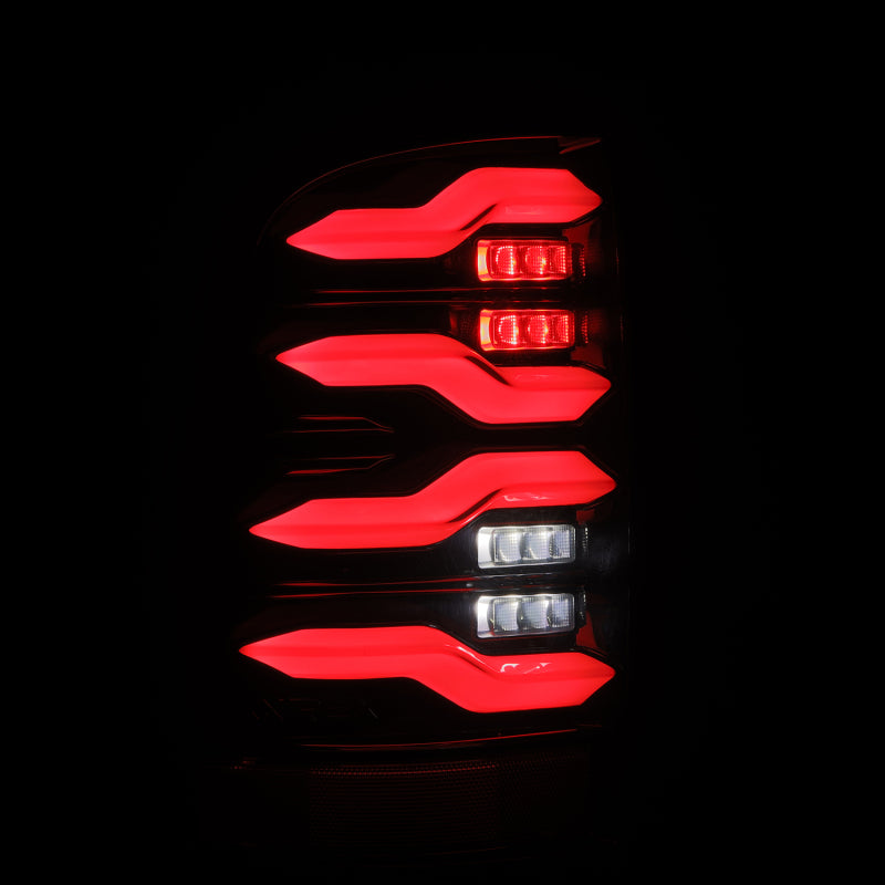 AlphaRex 09-18 Dodge Ram Luxx-Series LED Tail Lights Black w/ Activation Light & Sequential Signal 640004