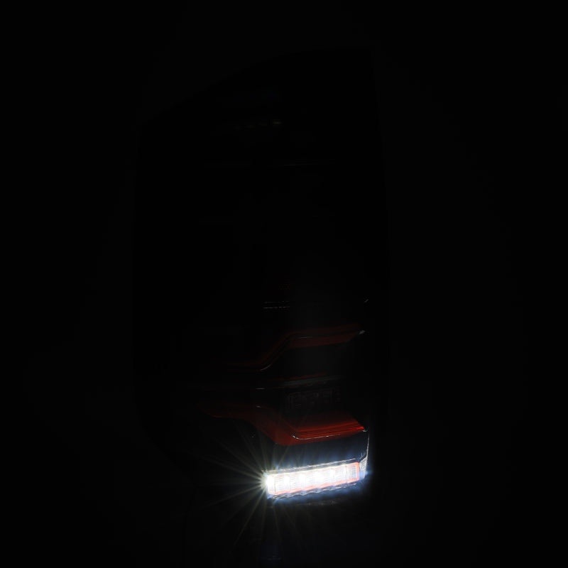 AlphaRex 14-21 Toyota Tundra LUXX LED Taillights Black/Red w/Activ Light/Seq Signal 672050