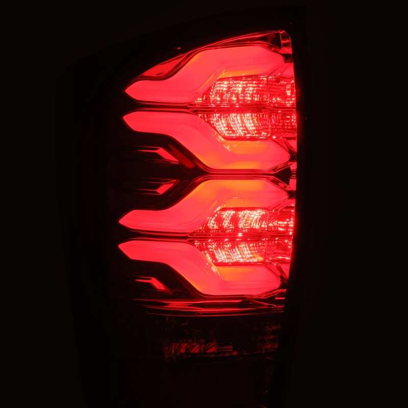 AlphaRex 16-21 Toyota Tacoma LUXX LED Taillights Blk/Red w/Activ Light/Seq Signal 680000