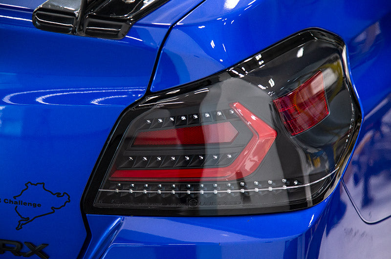 OLM Evolution Tail Lights (Clear Lens, Black Base, Red Bar) - 2015-2021 WRX / STI