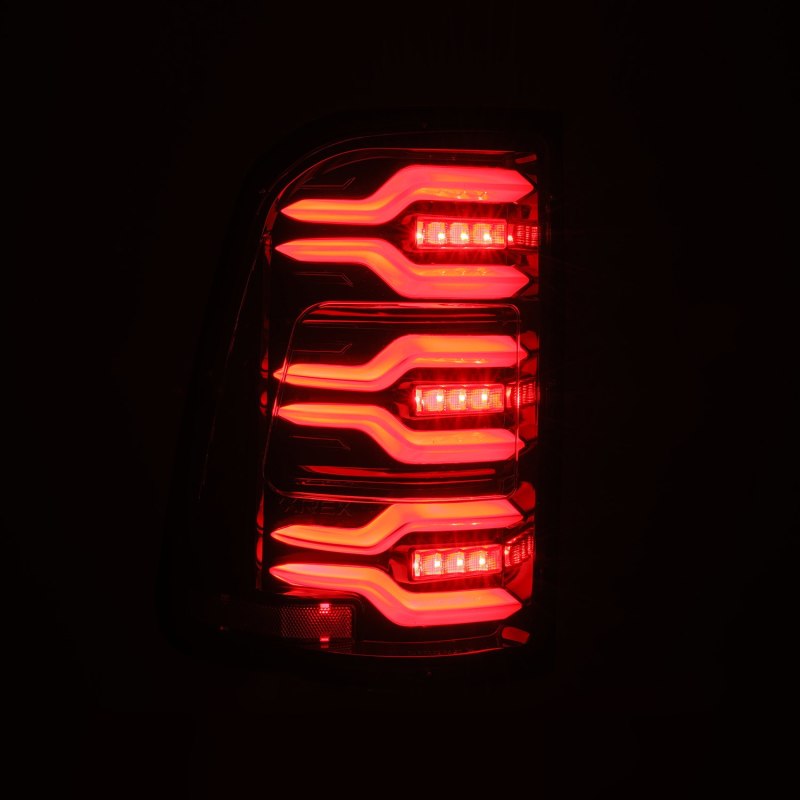 AlphaRex 19-21 Dodge Ram 1500 Luxx-Series LED Tail Lights Alpha-Black w/Activ Light/Seq Signal 640030