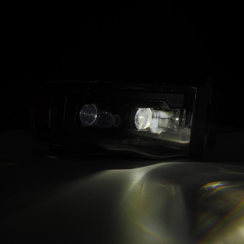 AlphaRex 02-05 Dodge Ram 1500 PRO-Series Projector Headlights Plank Style Alpha Black w/Seq Signal 880572