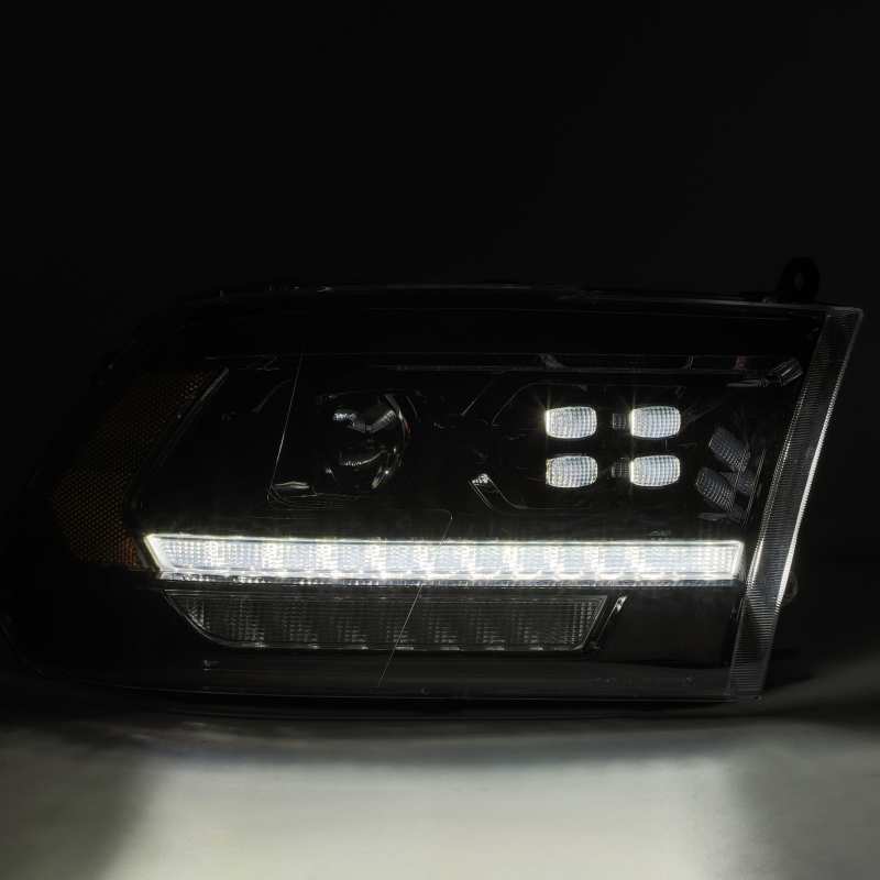 AlphaRex 09-18 Dodge Ram 2500 LUXX LED Proj Headlights Plank Style Black w/Activ Light/DRL 880526
