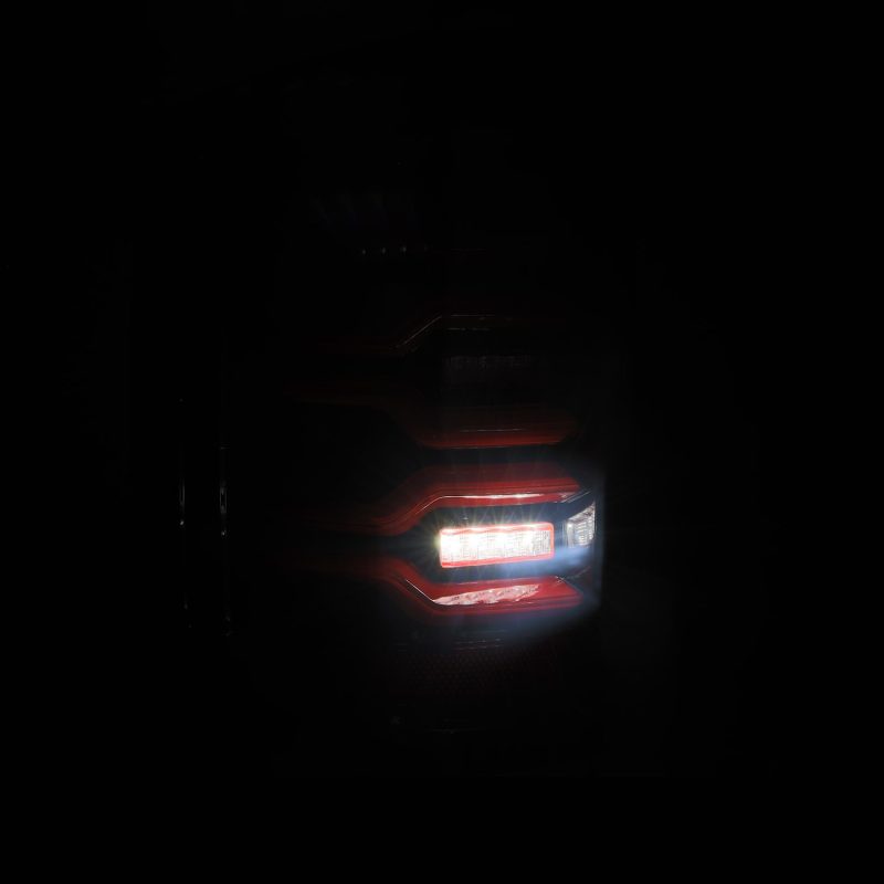 AlphaRex 14-18 Chevy Silverado 1500 Luxx-Series LED Tail Lights Black/Red w/Activ Light/Seq Signal 620050